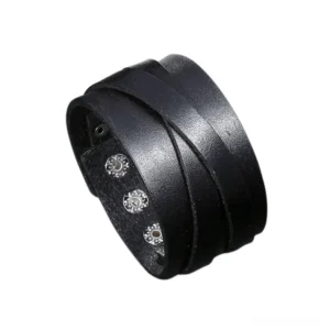 Black gothic wide leather wrap bracelet with metal snap closures, 3/4 side view showcasing dual-wrap design