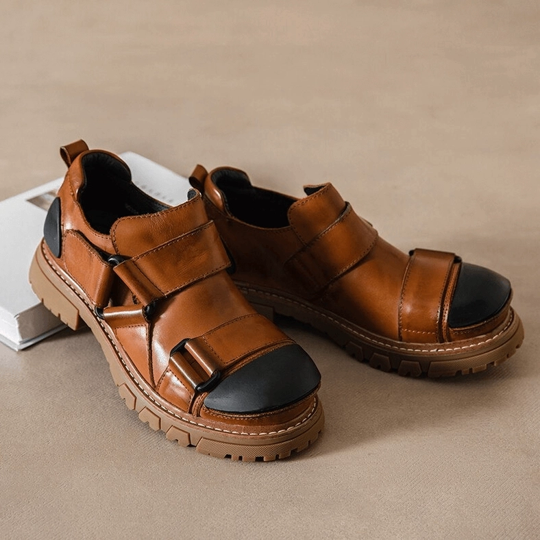 Black gothic punk loafers side profile showing platform sole thickness and leather grain quality