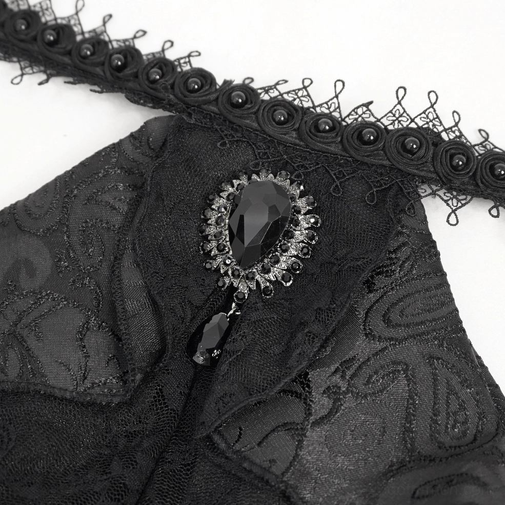 Full-length view of black gothic men's shirt with ruffled jabot and lace cuffs on mannequin display