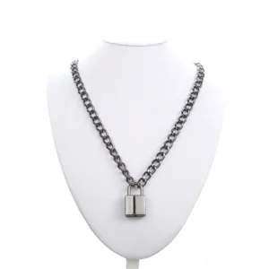 Black gothic padlock pendant on solid link chain necklace displayed on white jewelry mannequin, front view, industrial aesthetic dark jewelry