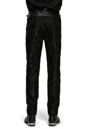 Black embroidered gothic pants rear full-body view showing damask floral pattern and leather waistband on male model