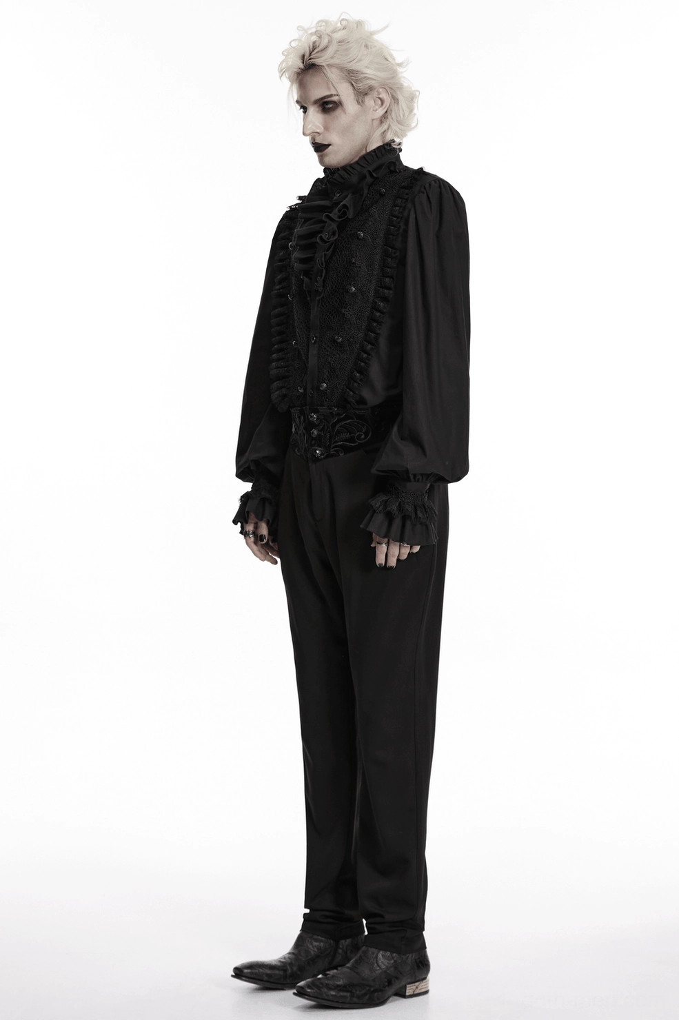 Flat lay product photography of black velvet embroidered gothic pants