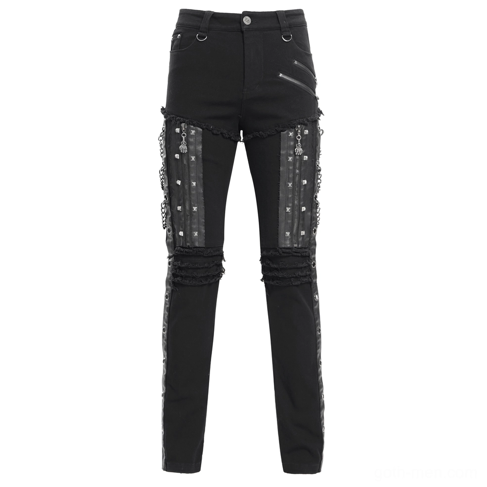 Front flat lay of black gothic slim-fit pants showing full design with zipper pockets and distressed details
