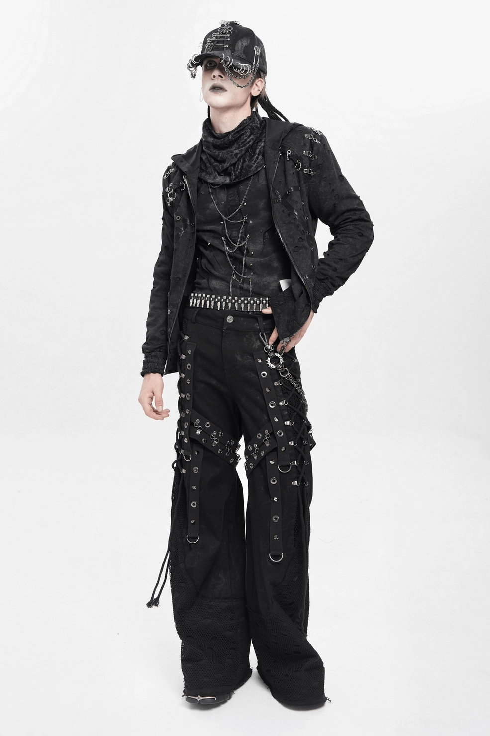 Black gothic wide leg pants hem detail showing distressed mesh and wide leg flare