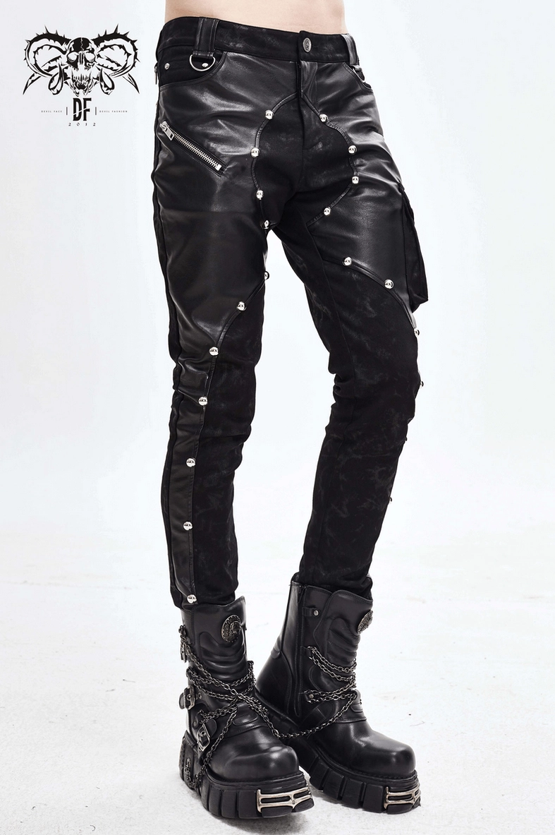 Black gothic leather pants rear three-quarter view - asymmetric rivet design and faux leather panel placement