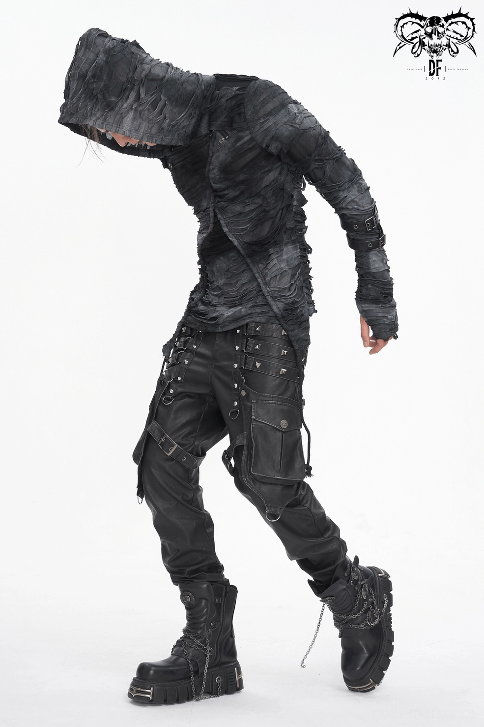 Black gothic pants detail view showing strap architecture, rivet patterns, cargo pocket function, and punk-inspired design elements