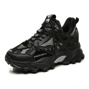 Black Gothic platform chunky sneakers with hybrid leather-mesh upper and thick lug sole, front-side three-quarter view