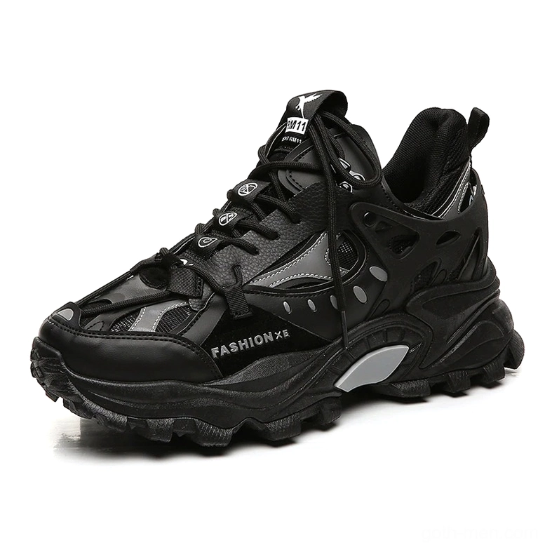 Black Gothic platform chunky sneakers with hybrid leather-mesh upper and thick lug sole, front-side three-quarter view