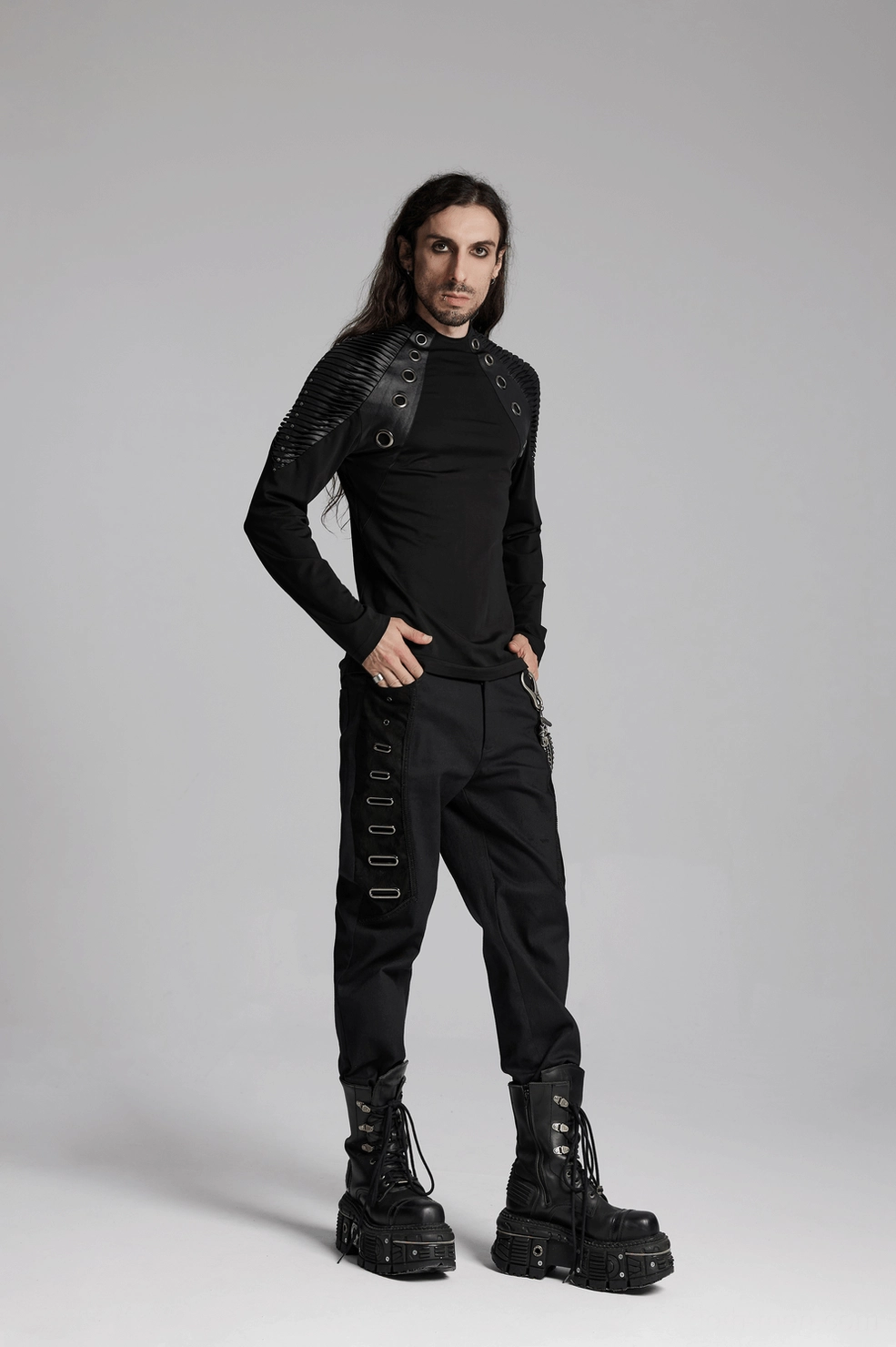 Black gothic top showcasing structural shoulder design and architectural silhouette