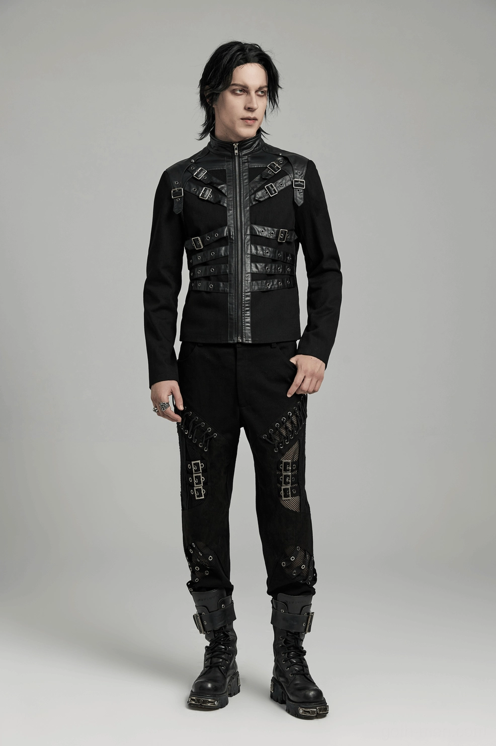 Black gothic punk jacket three-quarter view detail, highlighting buckle decoration pattern and overall silhouette