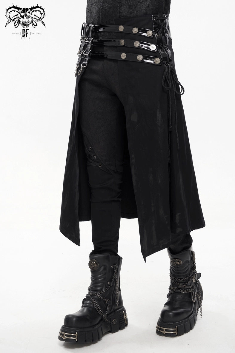 Full body front view of male model wearing black gothic punk kilt with distressed fabric and multi-strap waist hardware
