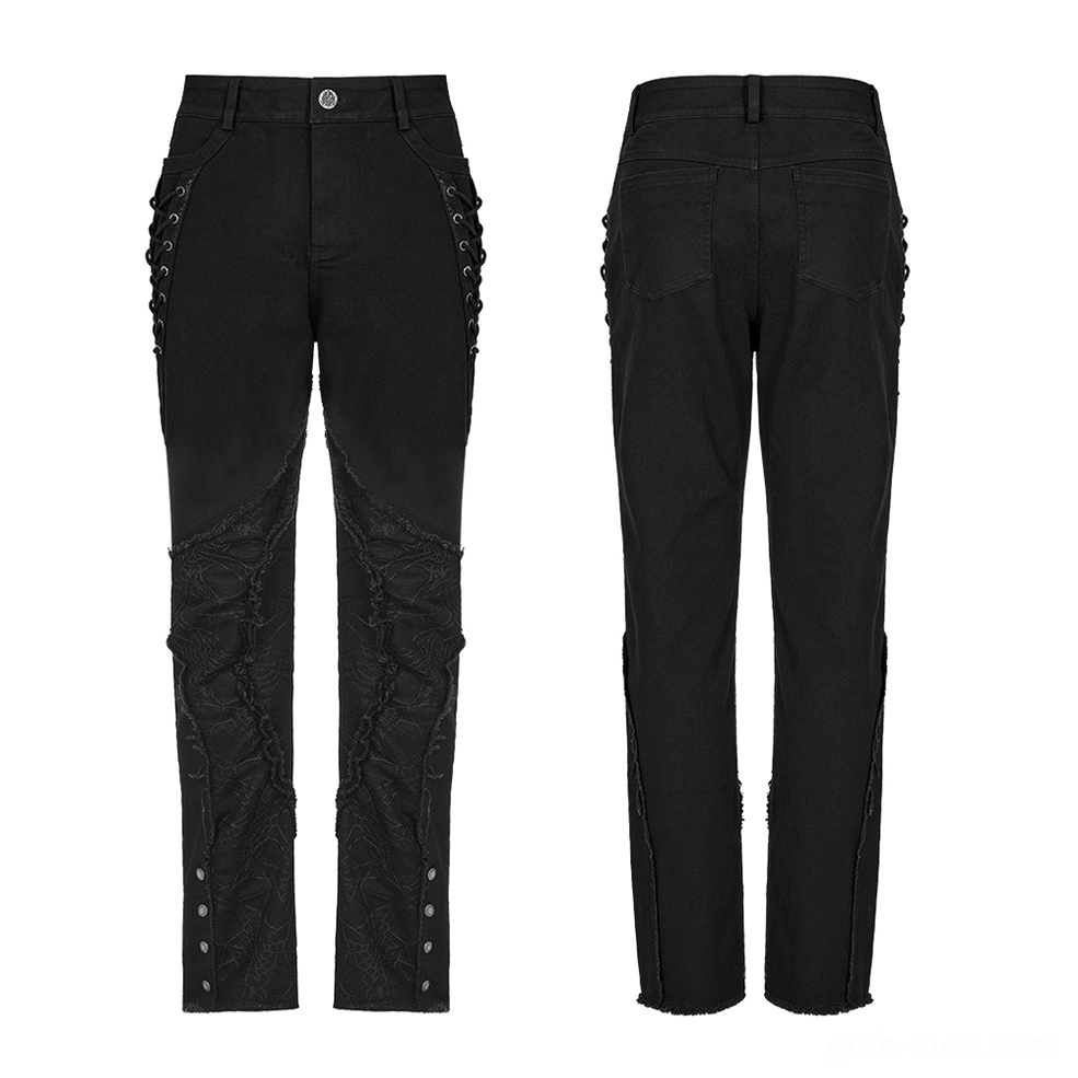 Gothic punk pants featuring distressed spider web patches and fitted black silhouette on white background