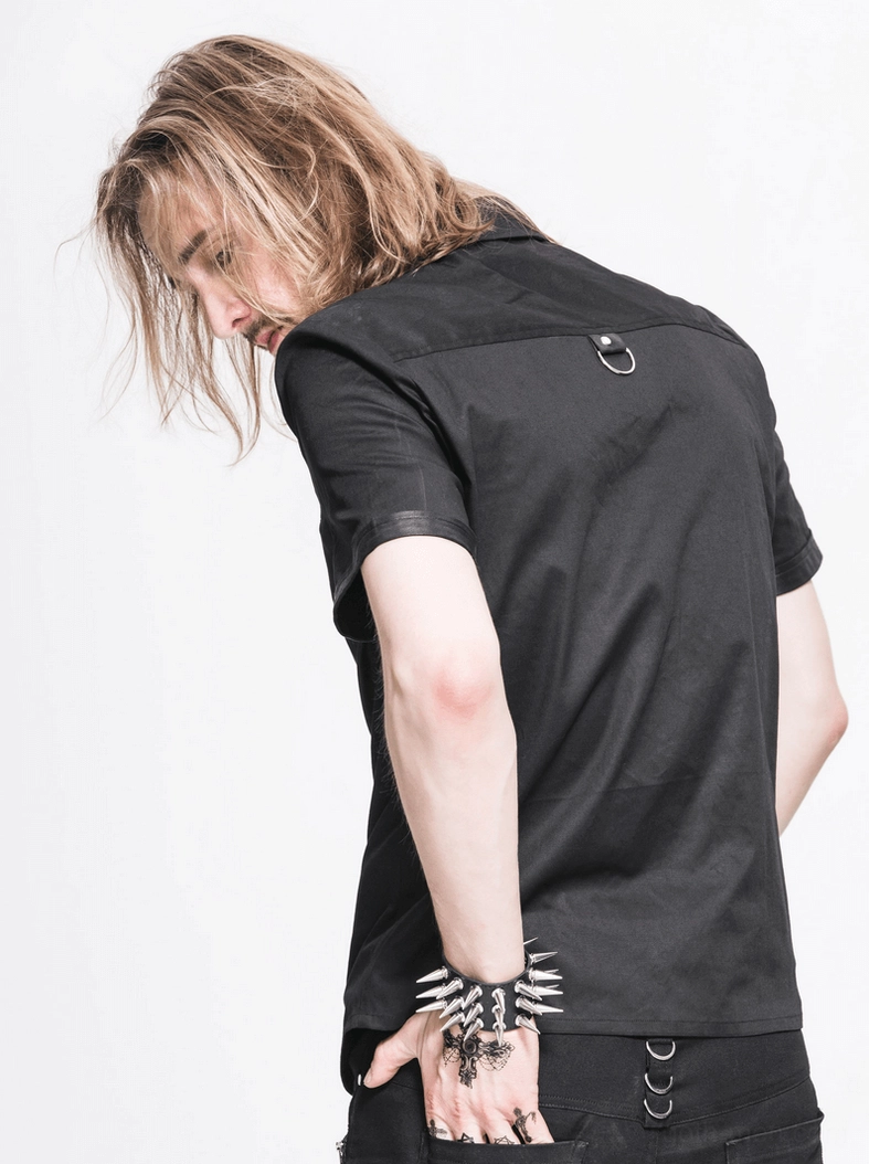 Black gothic punk shirt detail view showcasing leather trim quality, metal fasteners, and matte black woven fabric finish