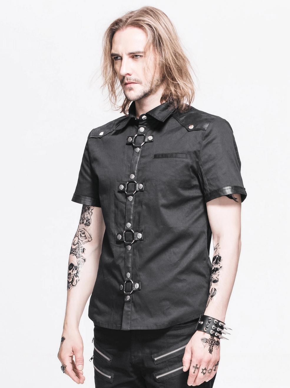 Black gothic punk shirt front placement showing metal stud embellishments, leather patches, and fitted construction