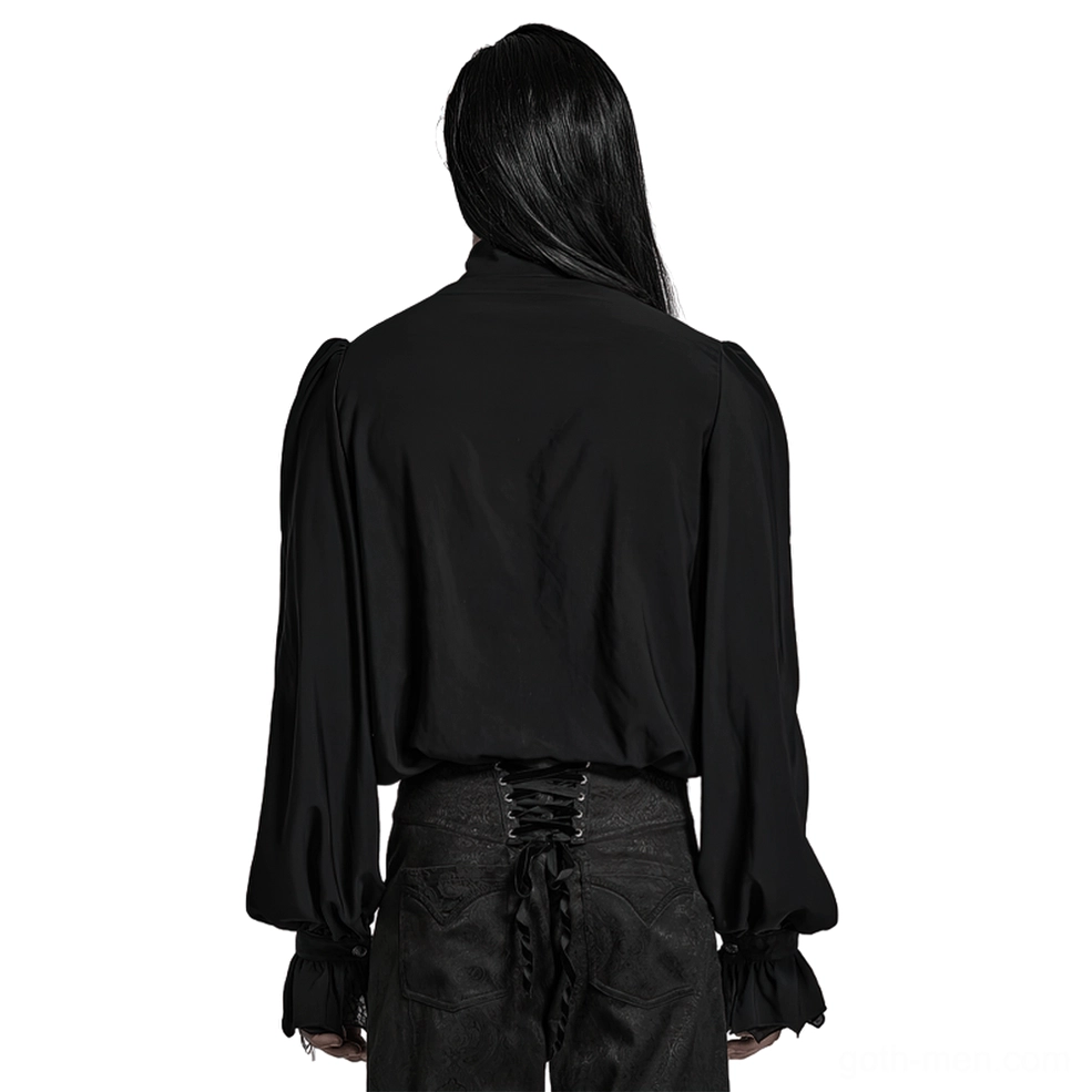 Black gothic ruffle shirt rear view showing solid back and flared ruffled cuffs, paired with lace-up gothic trousers