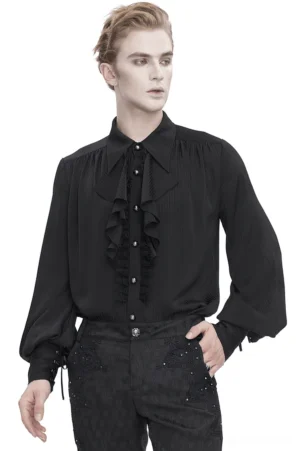 Black gothic ruffled lantern sleeve shirt front view on male model with gem button details and dramatic voluminous sleeves
