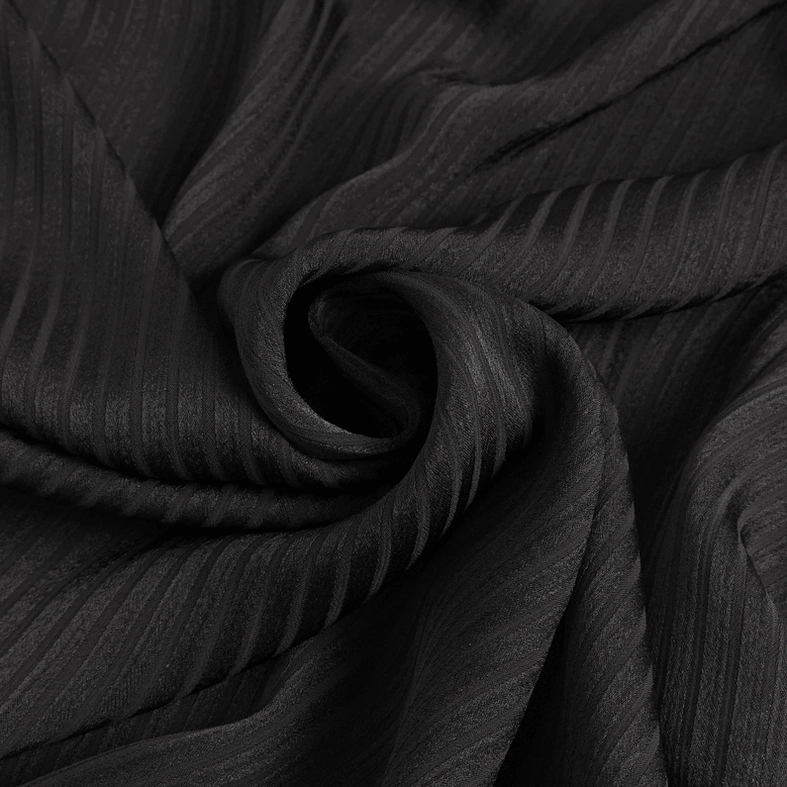 Vertical striped sheer overlay fabric texture detail of black gothic ruffled lantern sleeve shirt
