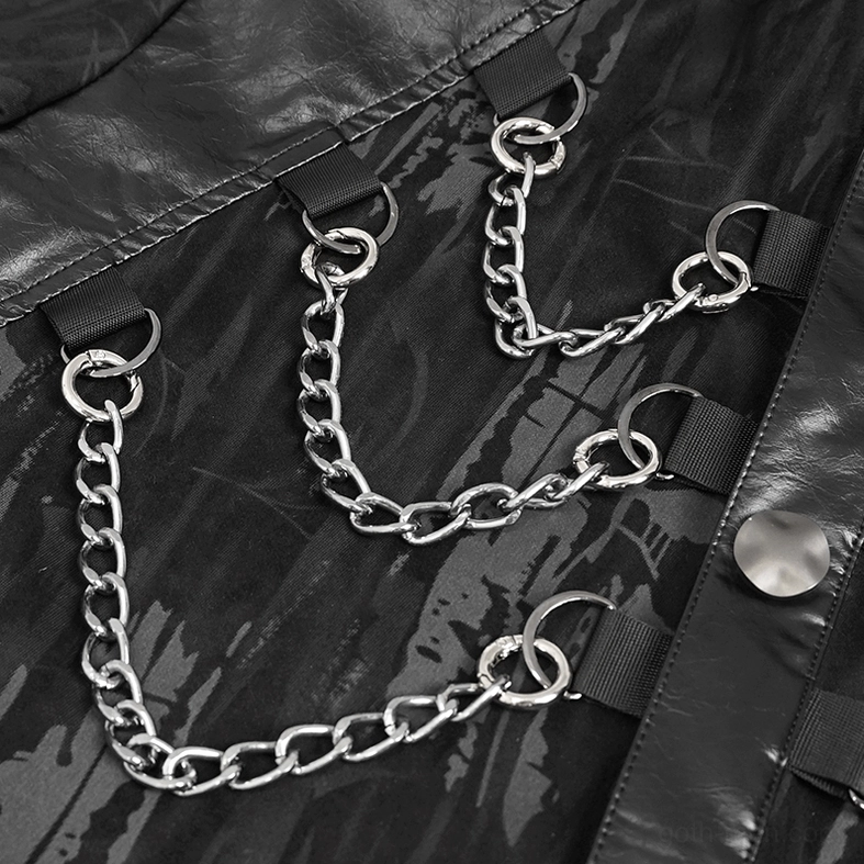 Detailed close-up of black gothic shirt chest hardware showing multi-layer chains D-rings and snap buttons