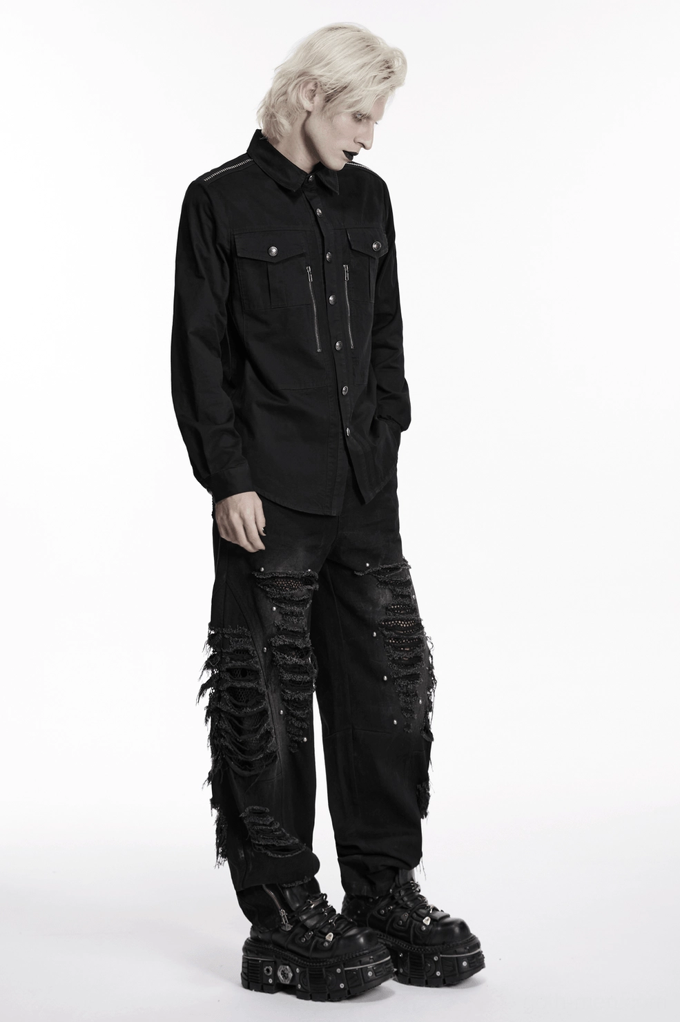 Black gothic workwear shirt cuff detail showing embossed metal button and precise stitchwork on cotton fabric