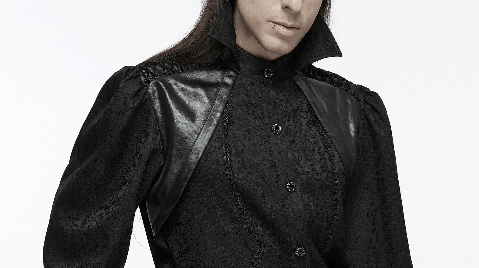 Black gothic shirt flatlay showing cuff details, faux leather accents, and sleeve construction