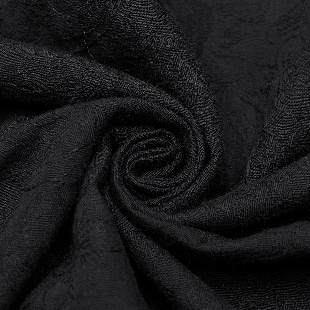 Black lace-up gothic shirt for men - close-up detail of gathered sleeve cuff with decorative button and embroidered texture