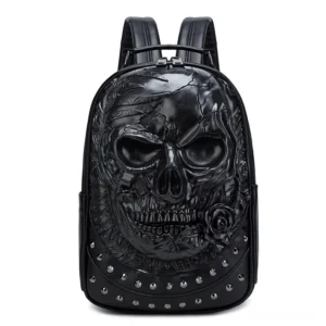 Black 3D embossed gothic skull backpack with studded accents - front view alternative fashion