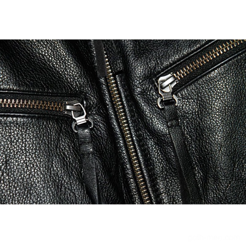 Flat lay of black genuine leather gothic motorcycle jacket displaying overall silhouette and craftsmanship