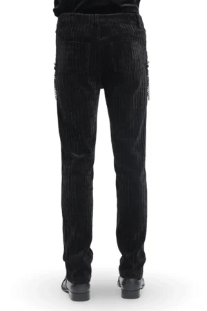 Black gothic slim fit trousers with chain embellishments - rear full body view showcasing back pocket design