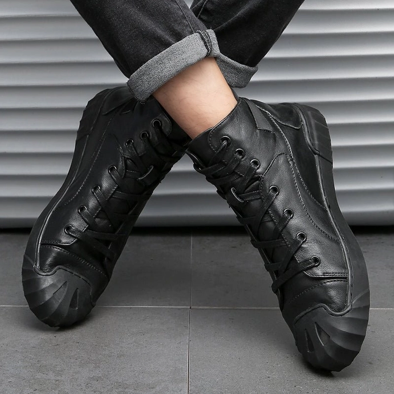 Black leather high-top gothic sneaker showing breathable insole and full-grain leather craftsmanship