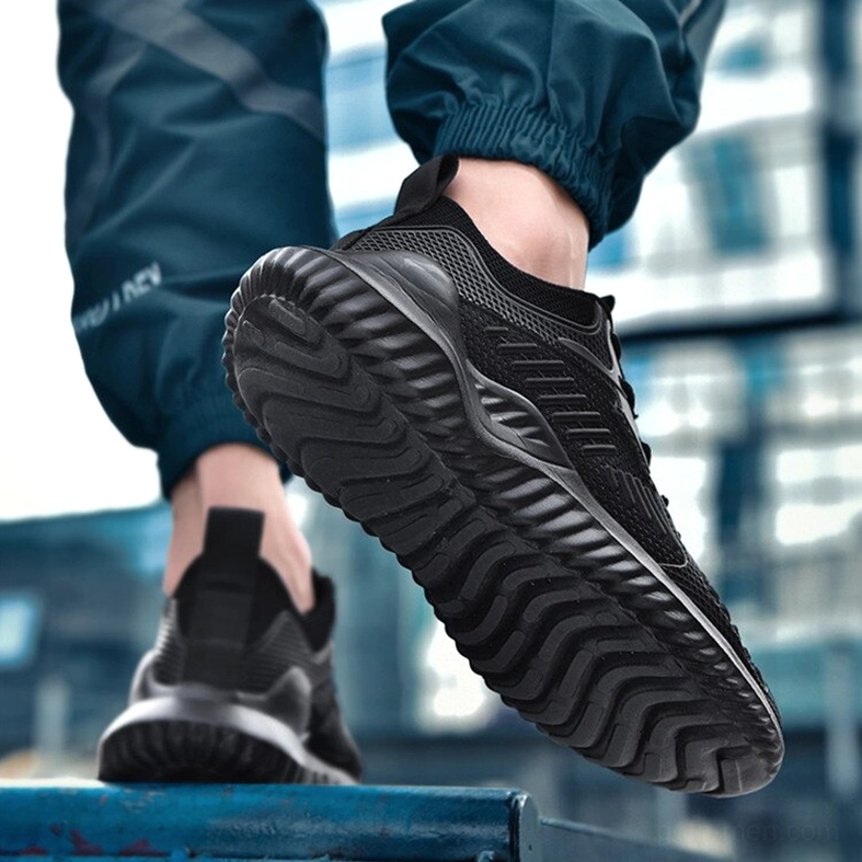 Black mesh gothic sneaker outdoor wear textured rubber outsole visible - urban alternative