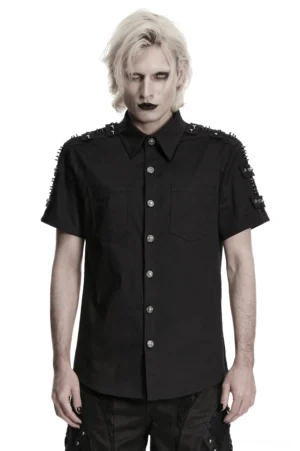 Black gothic studded shoulder shirt front view worn by model with blonde hair