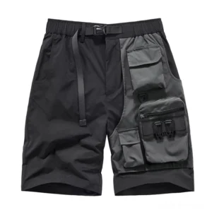 Black gothic tactical cargo shorts front flat lay view showing multiple utility pockets and colorblock design elements