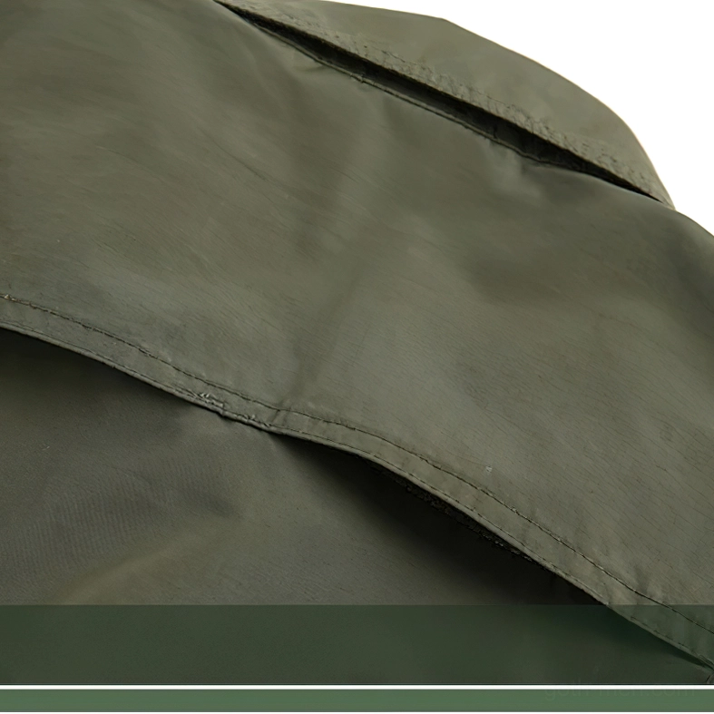 Black gothic tactical shirt side profile, demonstrating structured fit and sleeve construction details