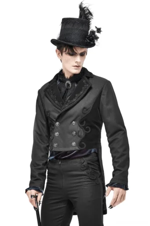 Black double-breasted gothic tail coat front view with feathered top hat on model, showing embroidered trim details and snap button closure