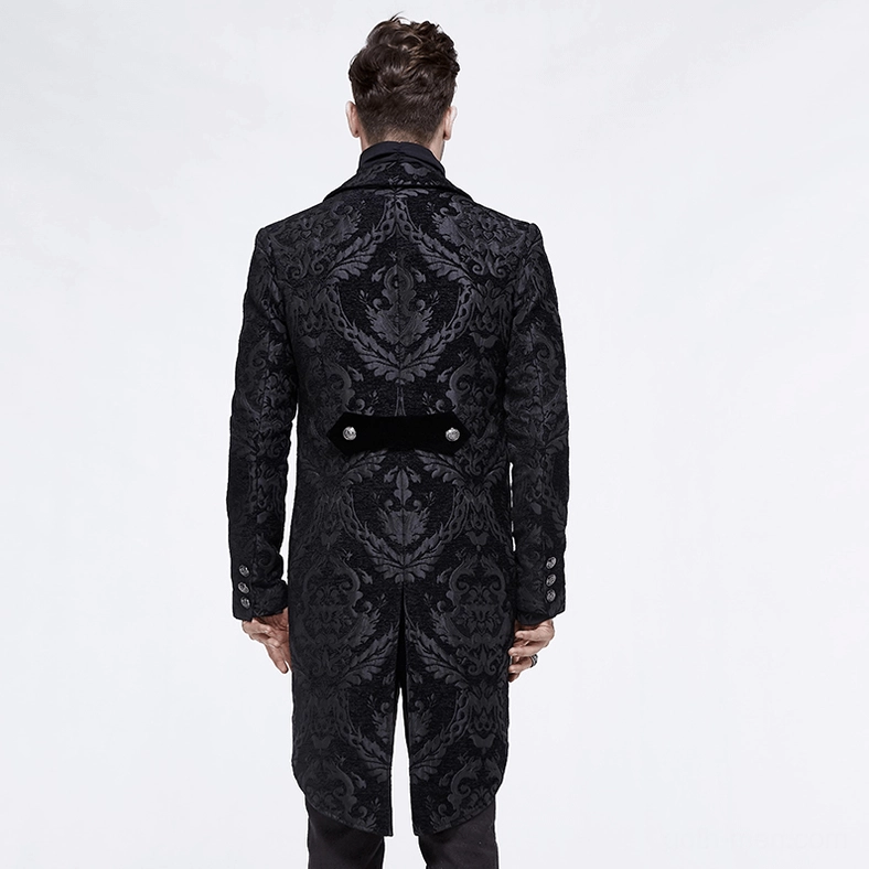 Black gothic tailcoat detail close-up – jacquard fabric texture and silver button embellishments