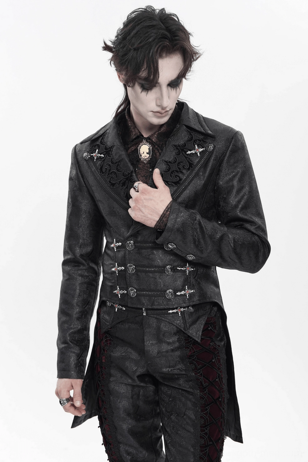 Black gothic tailcoat side profile view - showing jacket drape, asymmetrical hem, and refined tailored fit on male model