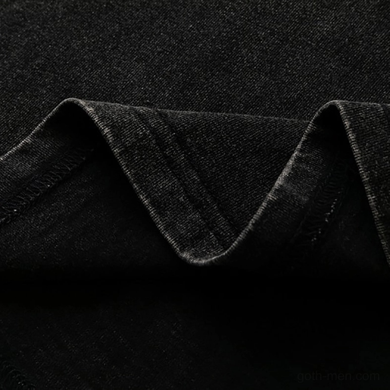 Sleeveless hem close-up of black gothic tank top displaying stitched rolled hem and premium cotton fabric texture