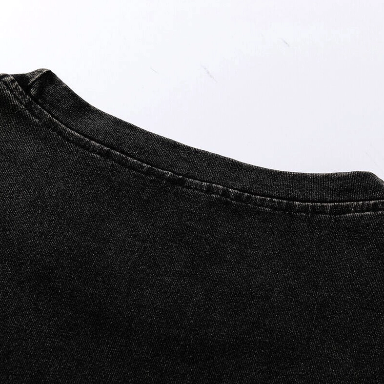 Rear neckline close-up of black gothic tank top showing stitched crew neck edge and vintage fabric finish