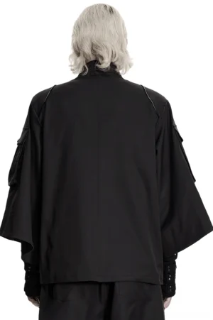 Rear wear view of black gothic techwear utility jacket displaying batwing sleeve design and clean back panel with industrial aesthetics