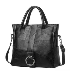 Black gothic vintage PU leather tote bag with metal ring accent and dual handles - front flat view