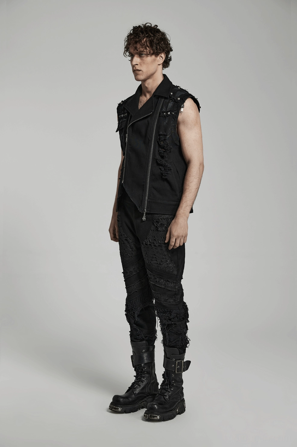 Black gothic ripped trousers fabric composition and stitching quality close-up