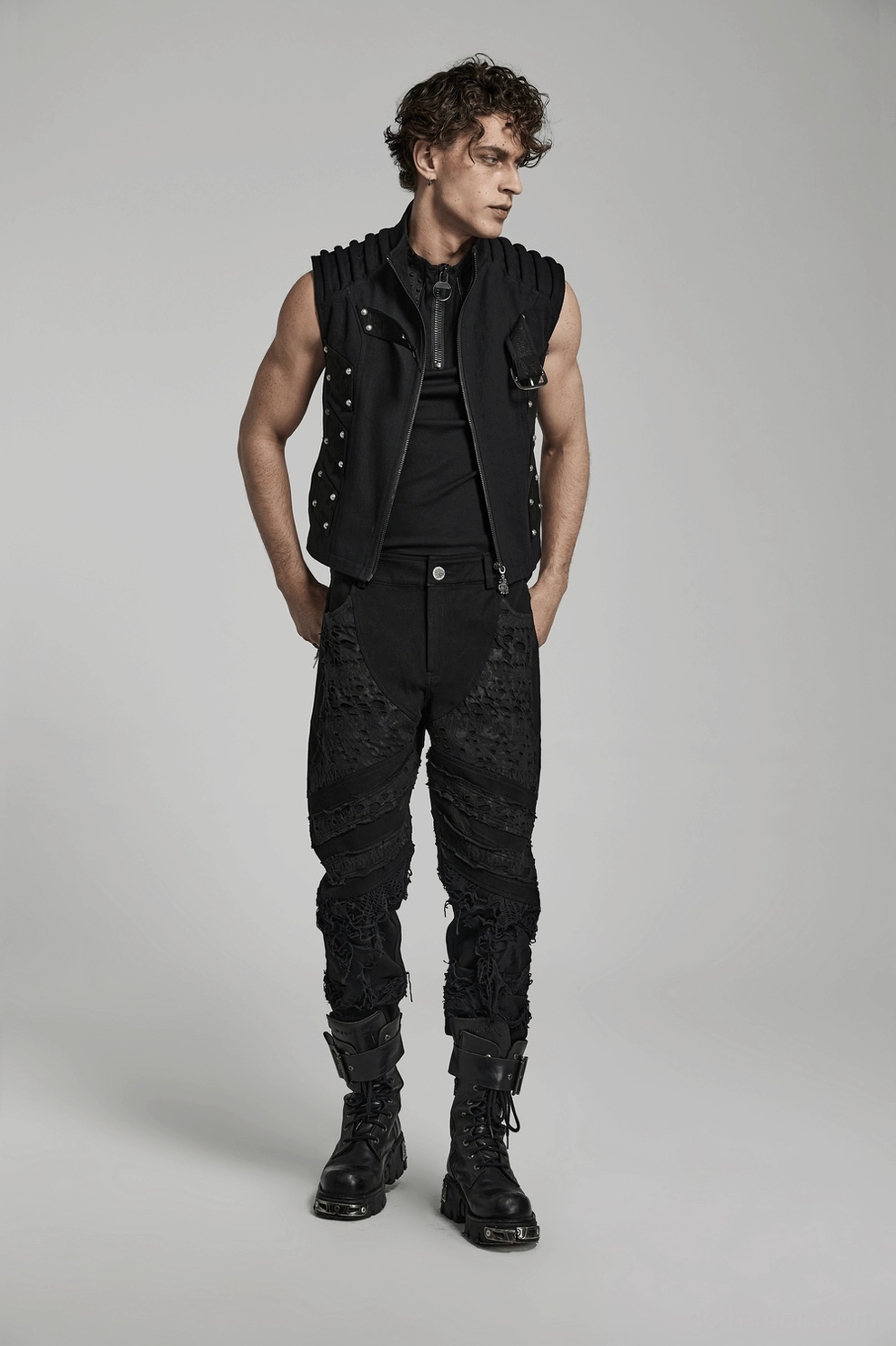 Black distressed ripped knit gothic trousers hem detail showing frayed finishing