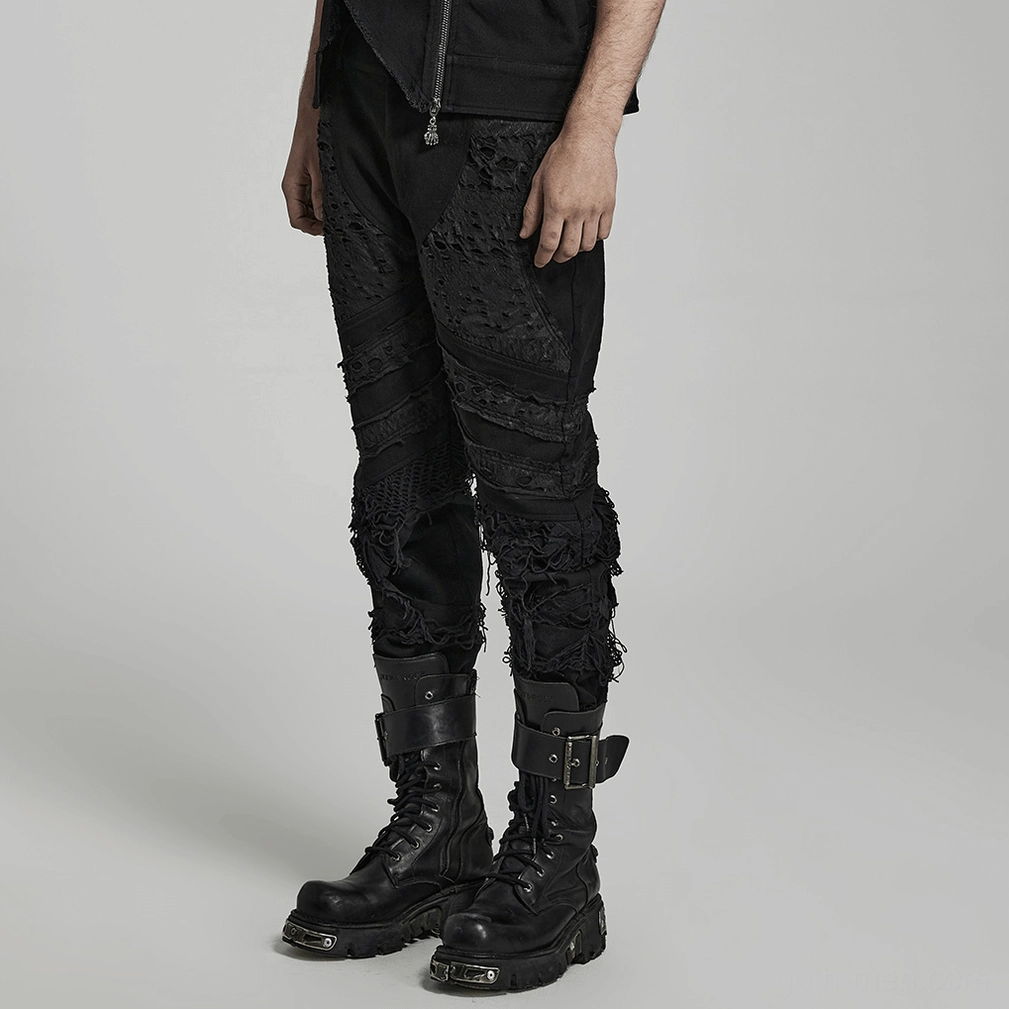Black distressed gothic trousers front detail showing ripped panel construction