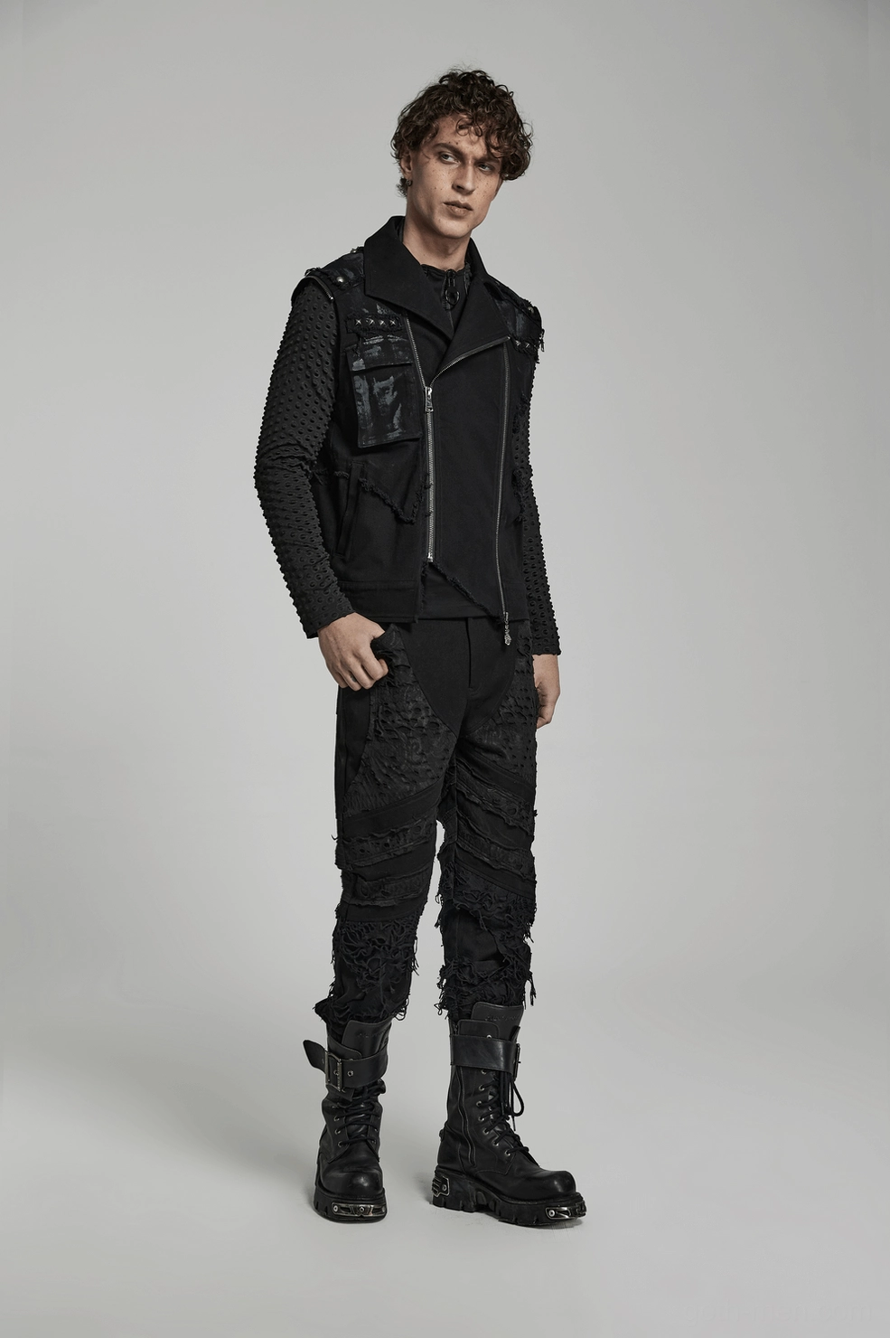 Black ripped gothic trousers waistband and upper leg construction close-up