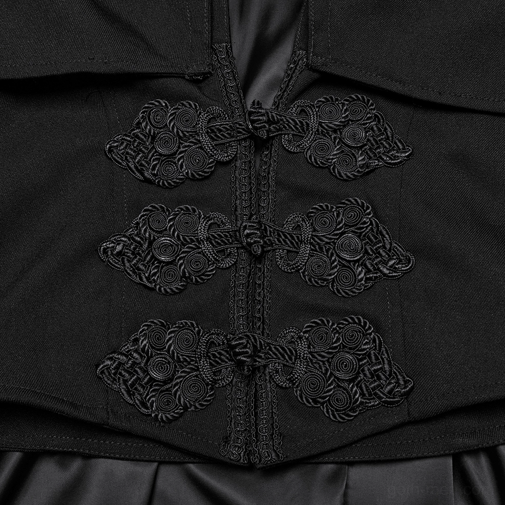 Close-up of ornate braided frog toggle and knotwork fasteners on black gothic vest closure with intricate detail