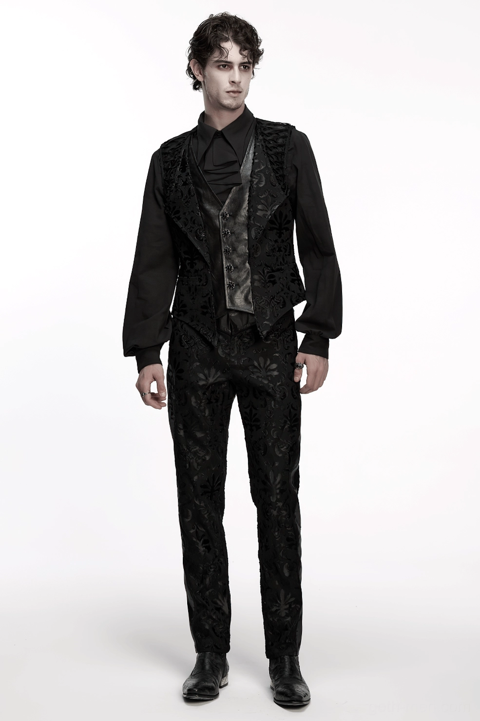 Black gothic waistcoat texture detail showcasing damask embroidery pattern and fabric quality close-up