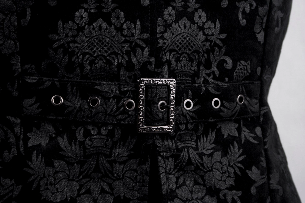 Detailed close-up of black gothic waistcoat waist buckle, metal fasteners, and eyelet detailing on jacquard fabric