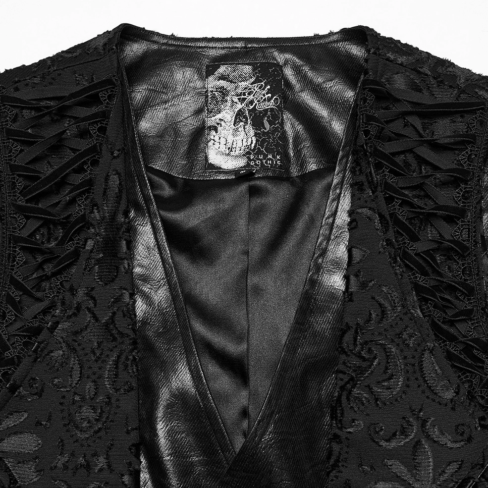 Black gothic waistcoat neckline detail close-up showing satin lining and lace lapel trim with skull label
