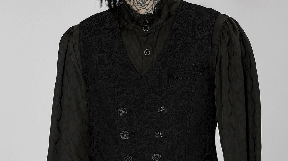 Black gothic waistcoat styled with ruffled Victorian blouse on tattooed model, partial front close-up view