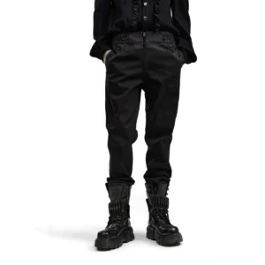 Black jacquard gothic slim-fit trousers front view on model, sleek tailored silhouette with decorative waist panel